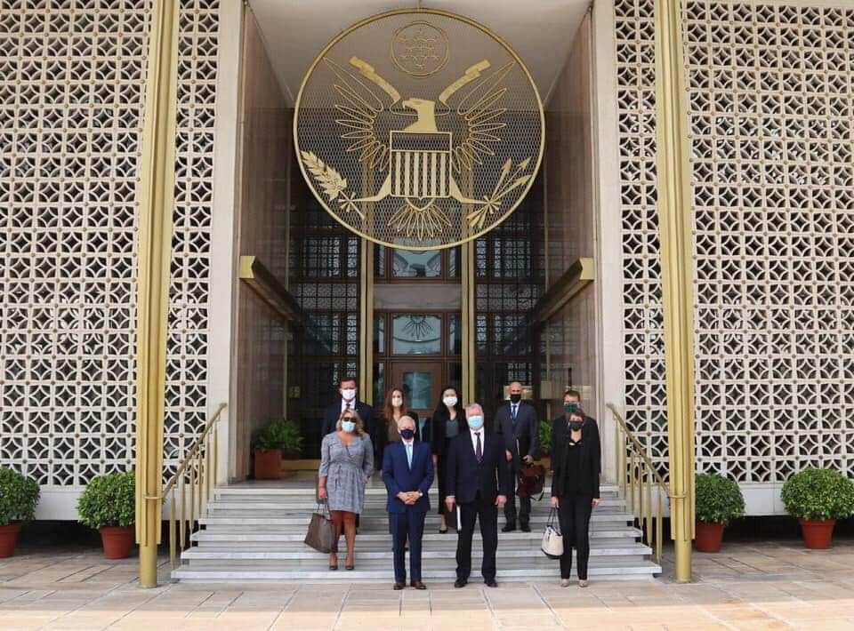 U.S. Embassy New Delhi main entrance with Great Seal, Shantipath, Chanakyapuri, daytime view showing steps and facade